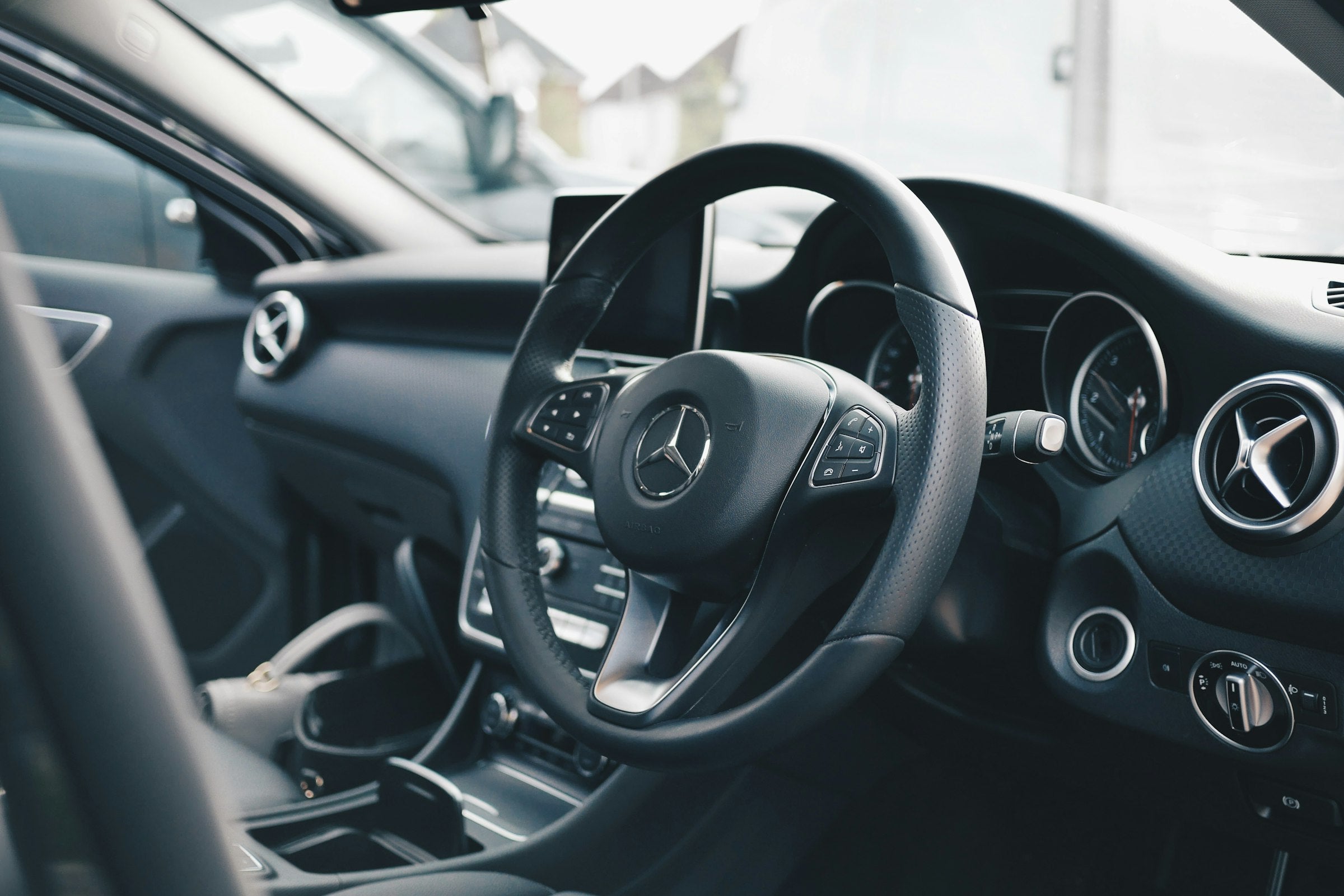 Bannière Drive Kit — détail habitacle voiture premium
